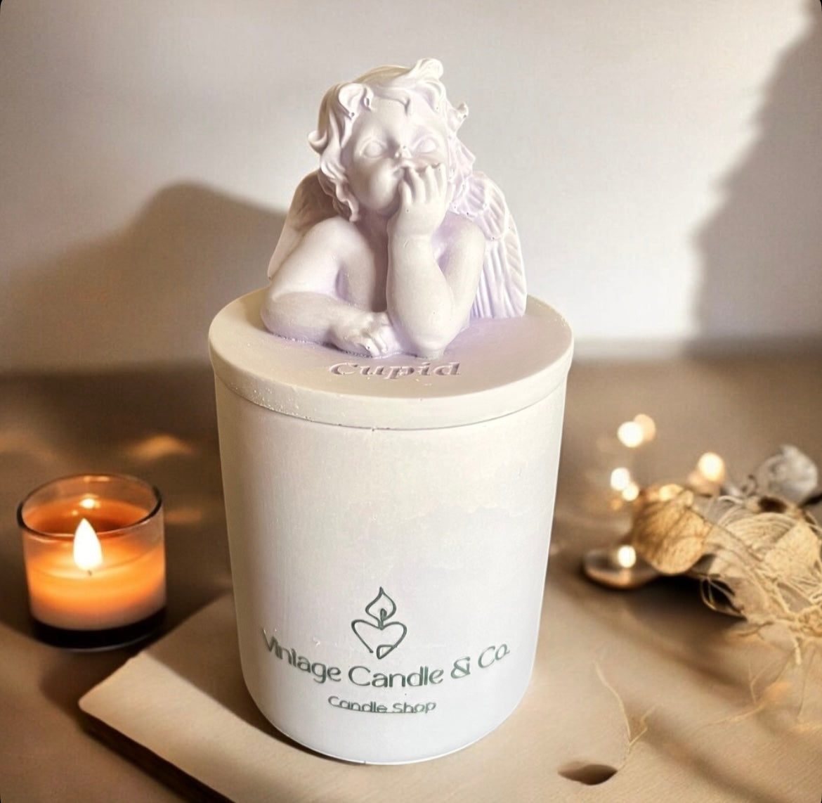 Cupid candle with lid.